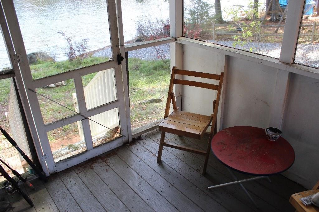 27 Quimby Lane Fayette, ME 04349 - Photo 2 of 23 Screened Porch great for sitting or...