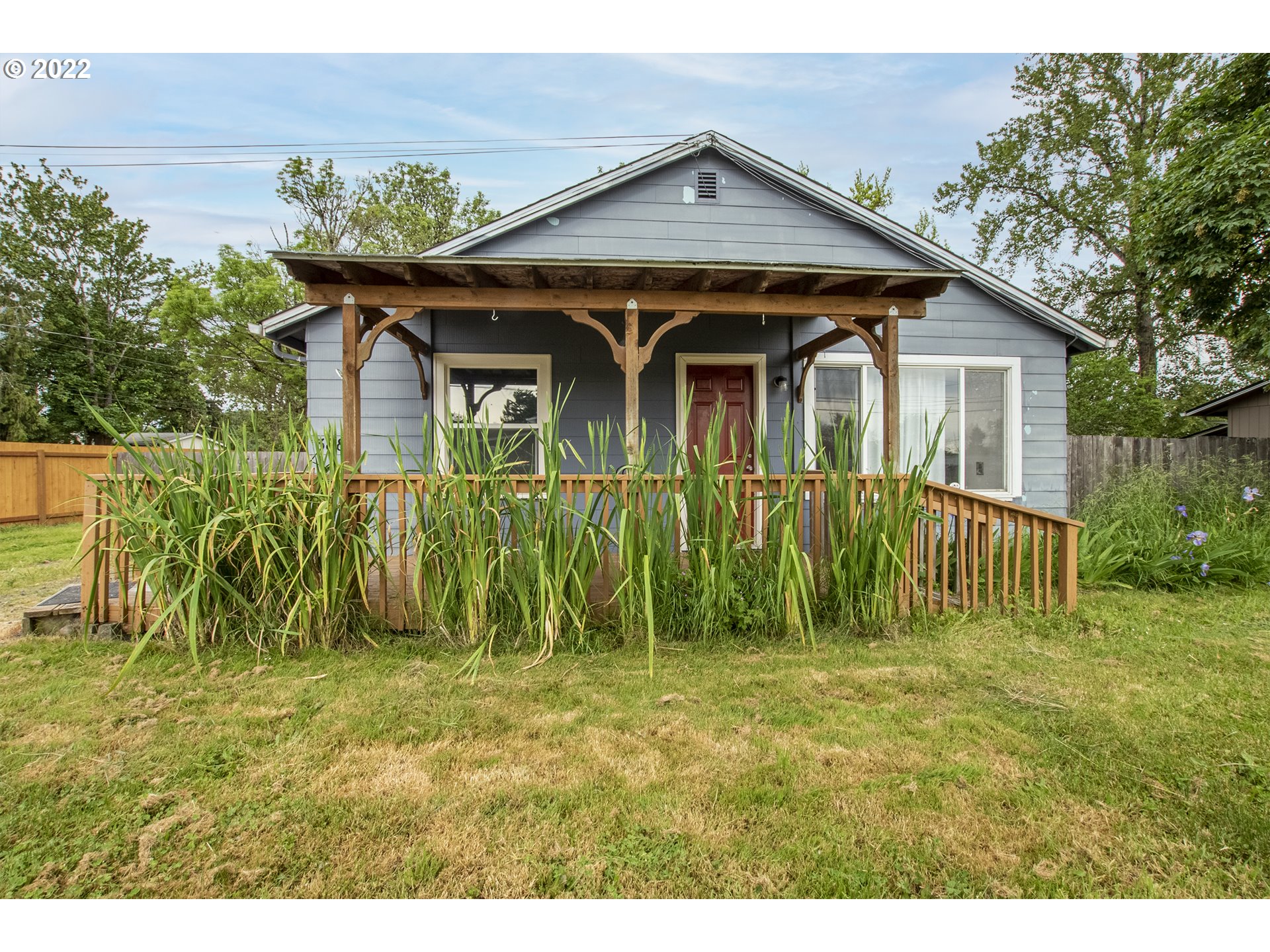 388 South 46th Street Springfield, OR 97478 - Photo 1 of 22 a front view of a house with a yard