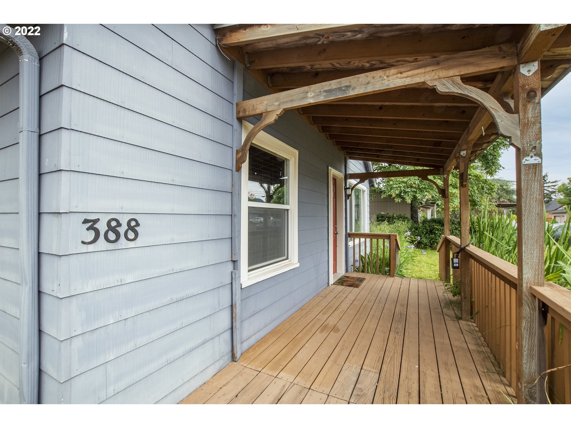 388 South 46th Street Springfield, OR 97478 - Photo 2 of 22 a view of balcony with wooden floor