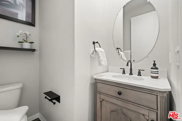 a bathroom with a sink and a toilet