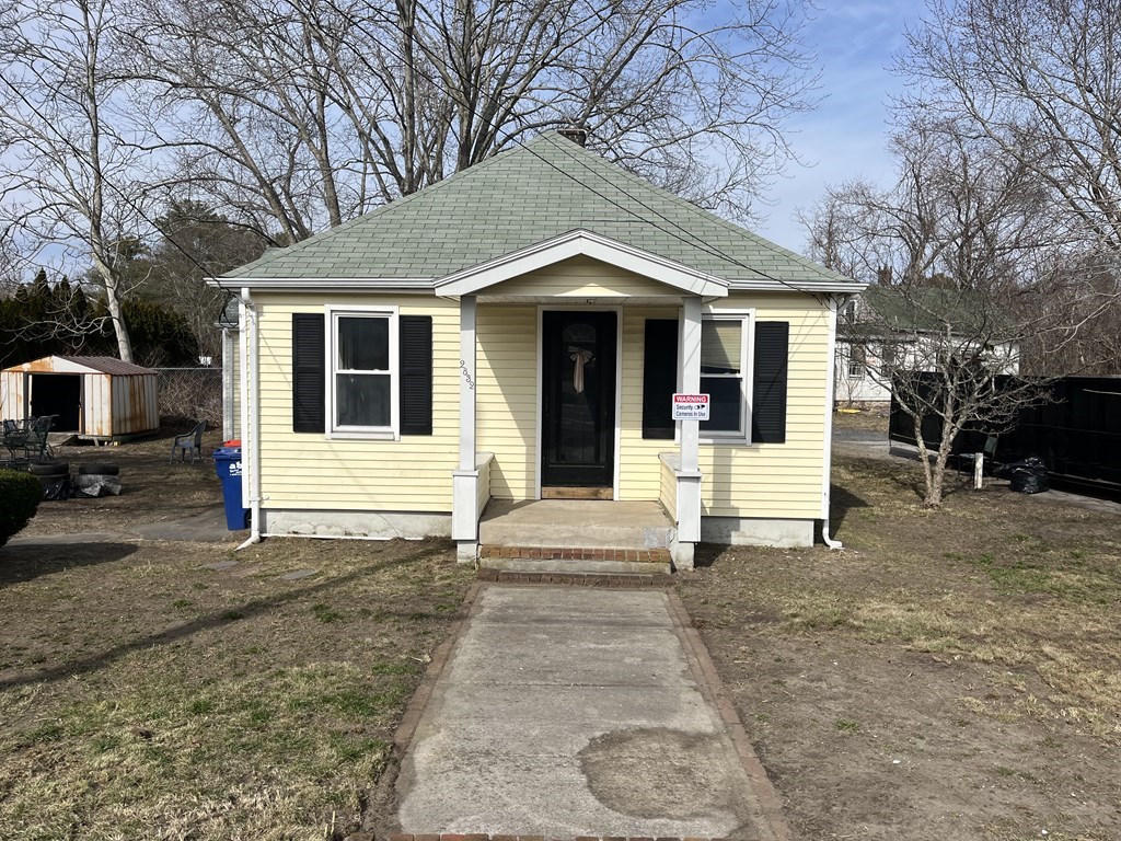 a house with trees in front of it
