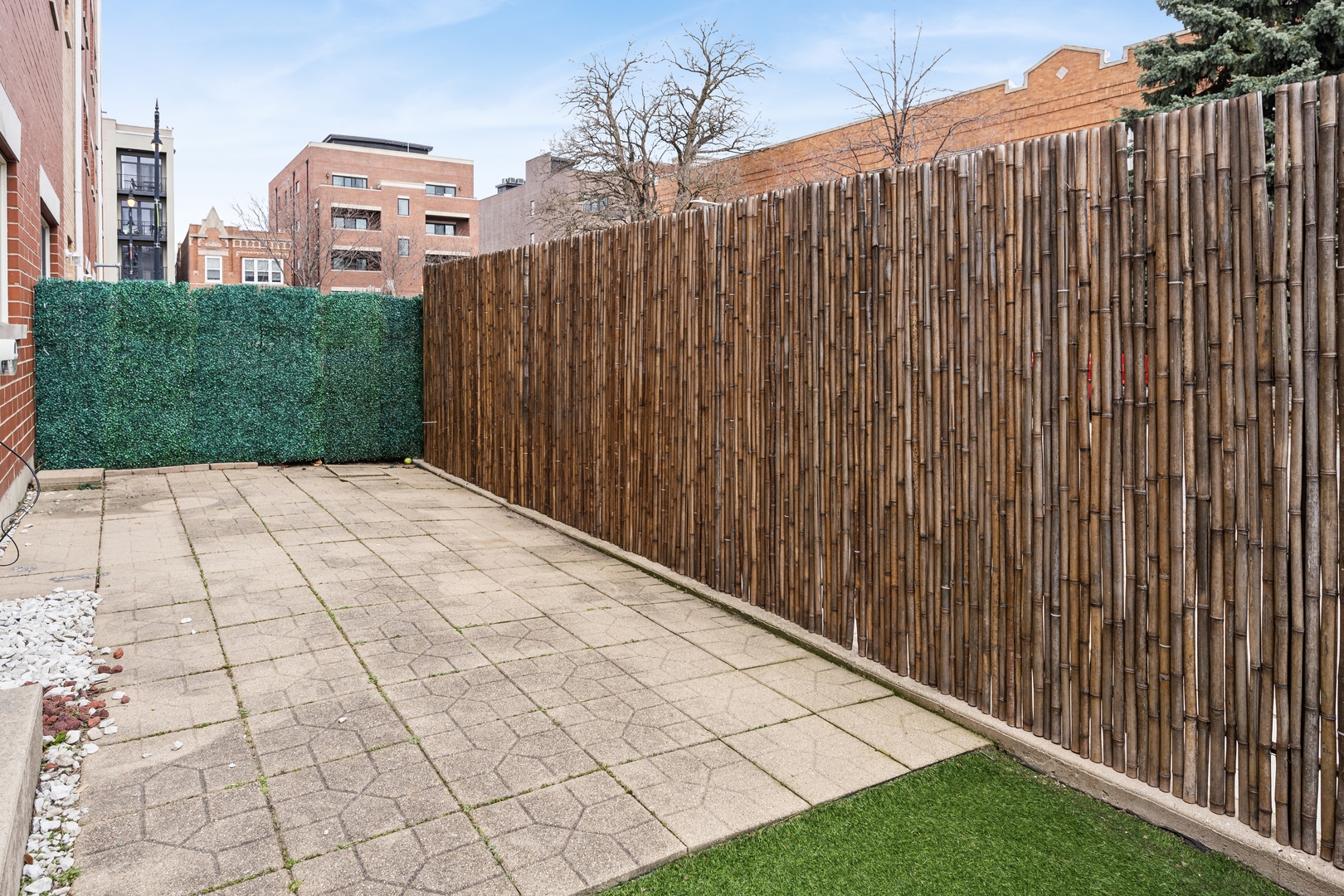 3337 West Irving Park Road, Unit 5 Chicago, IL 60618 - Photo 14 of 20 a view of a backyard