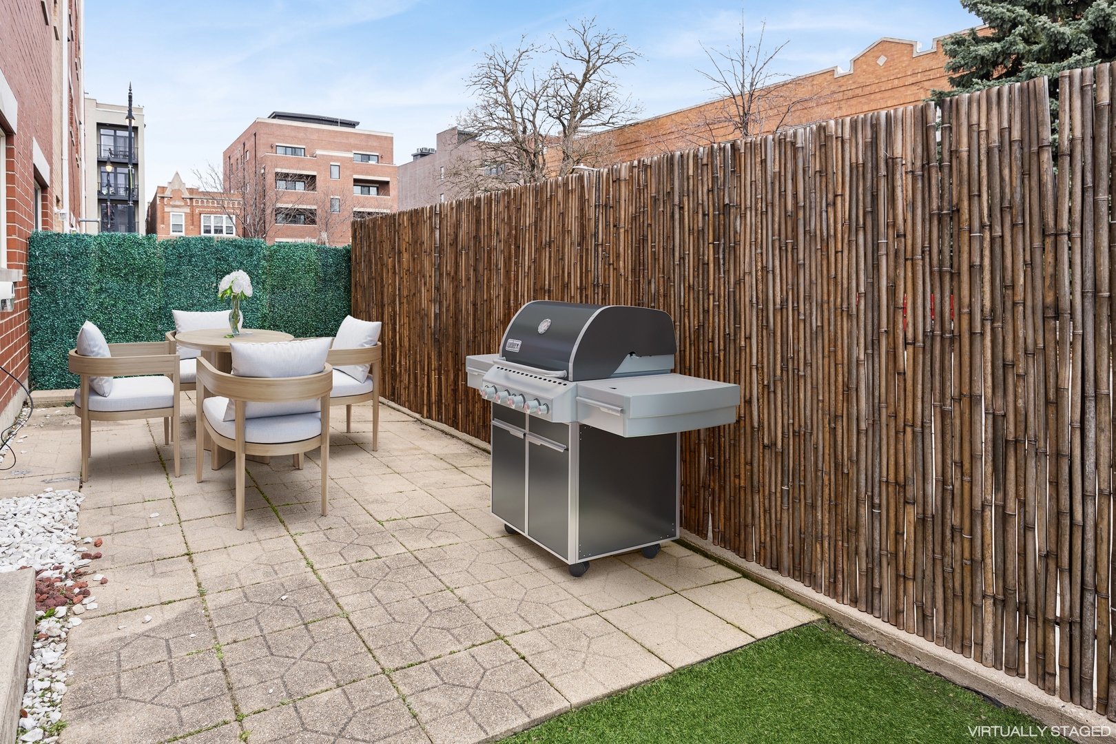 3337 West Irving Park Road, Unit 5 Chicago, IL 60618 - Photo 15 of 20 a view of a chairs and table in the back yard of a house