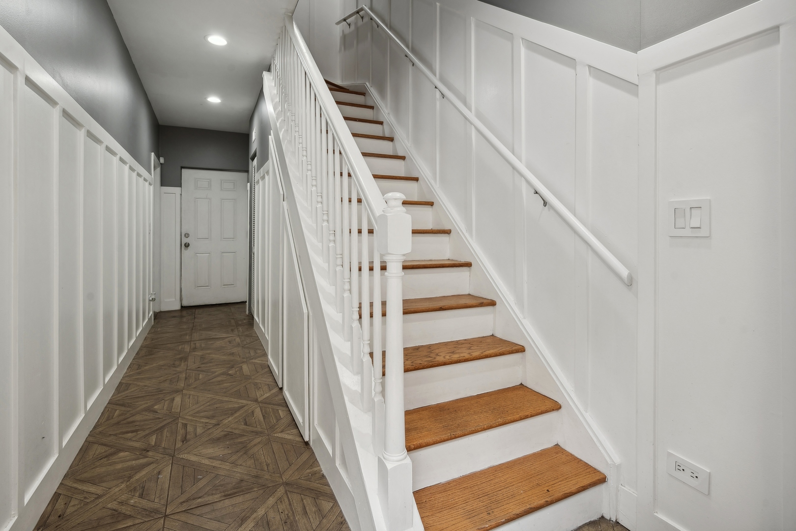 3337 West Irving Park Road, Unit 5 Chicago, IL 60618 - Photo 2 of 20 a view of a hallway with staircase
