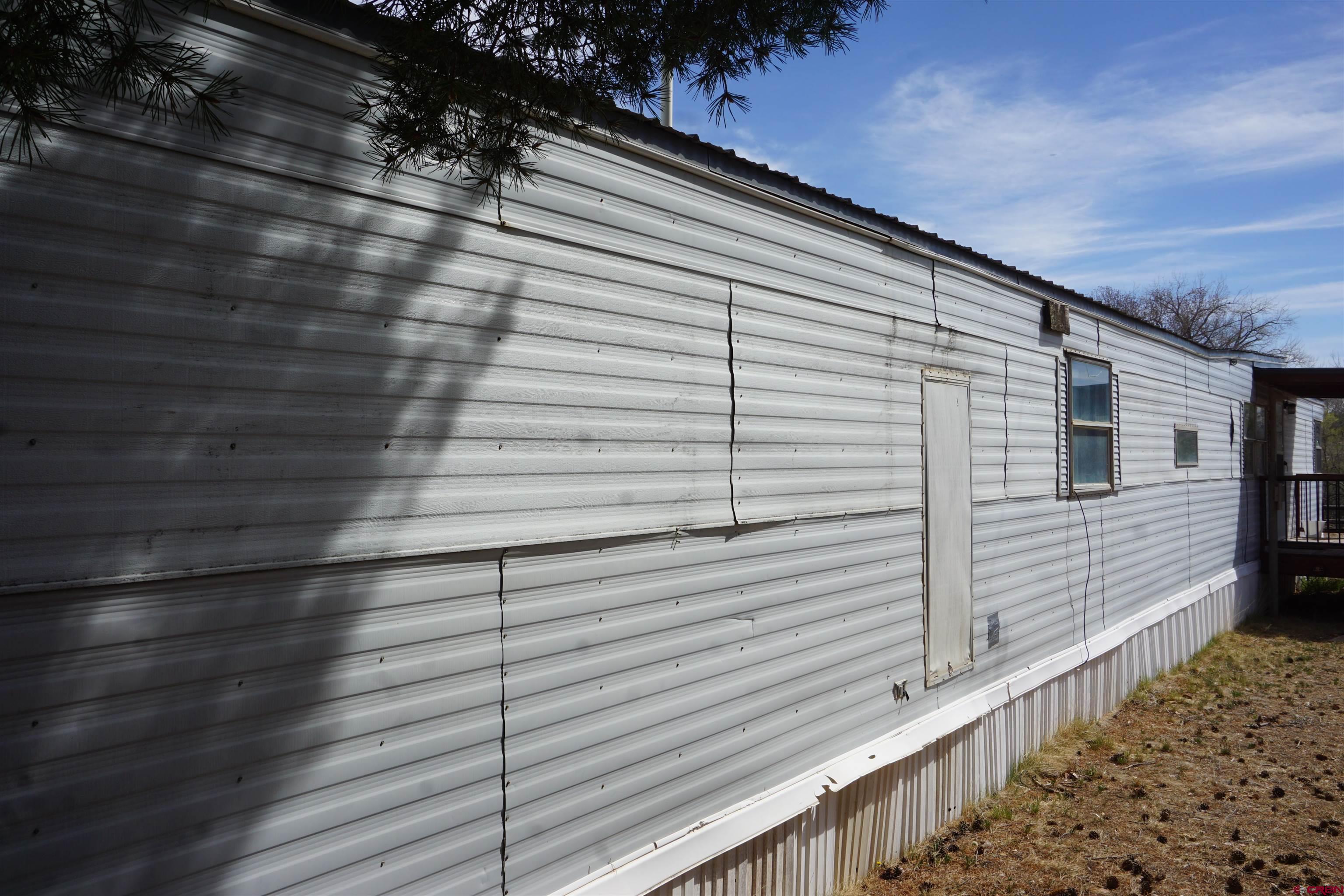 60497 Maple Grove Road Montrose, CO 81403 - Photo 4 of 16 a view of wooden fence