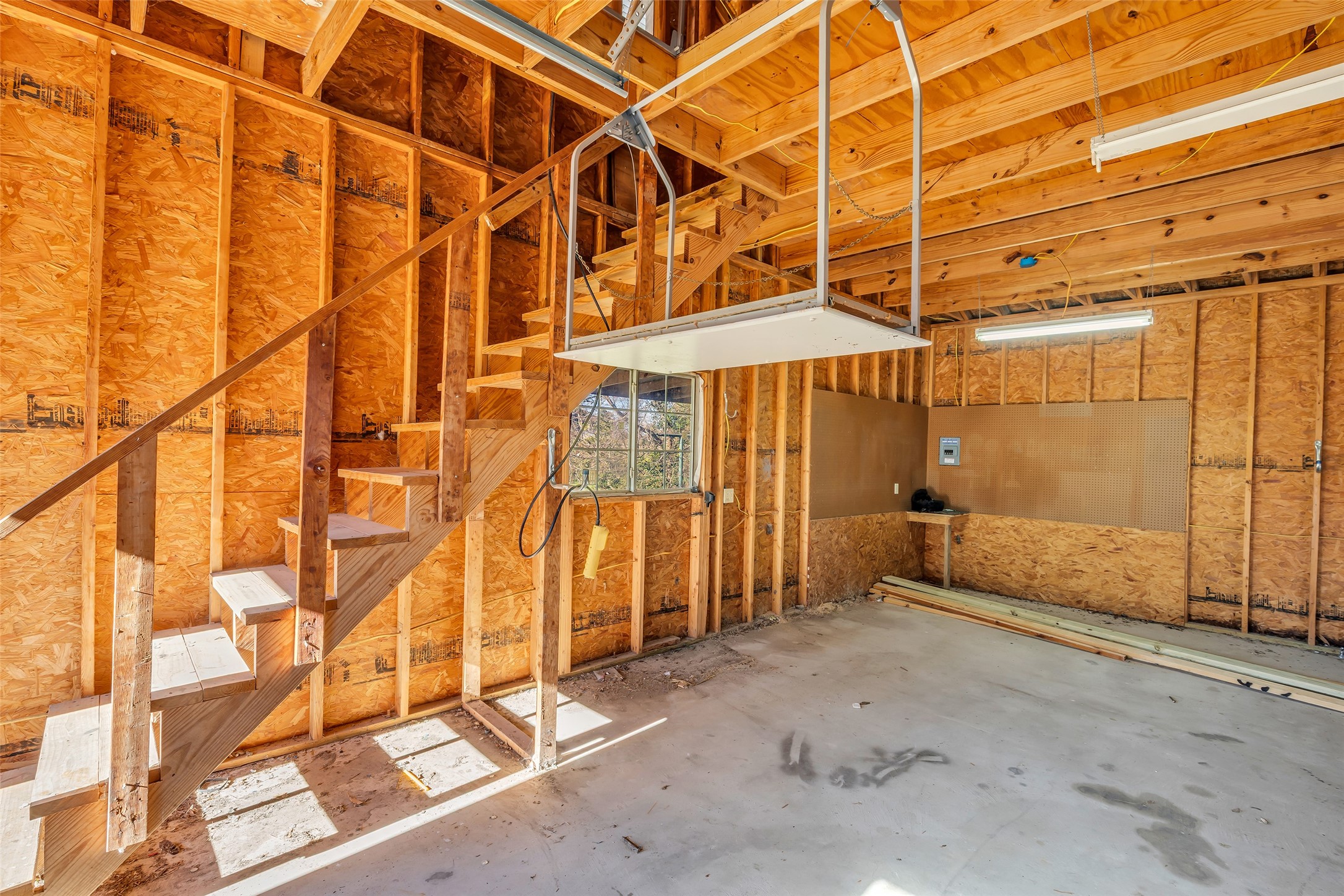 1075 Harrisburg Road Brenham, TX 77833 - Photo 37 of 48 Stairs and cargo lift, make utilizing the upstairs storage space super easy