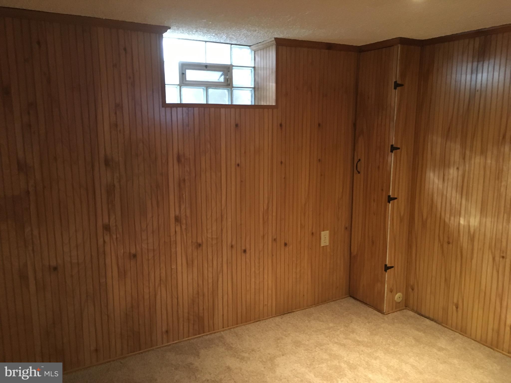 8103 Edwill Avenue Rosedale, MD 21237 - Photo 23 of 31 a view of an empty room with windows