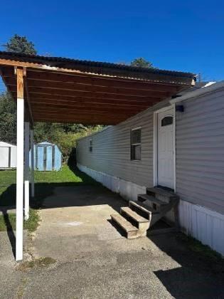293 Festival Road Washington, PA 15301 - Photo 1 of 10 a front view of a house with a yard