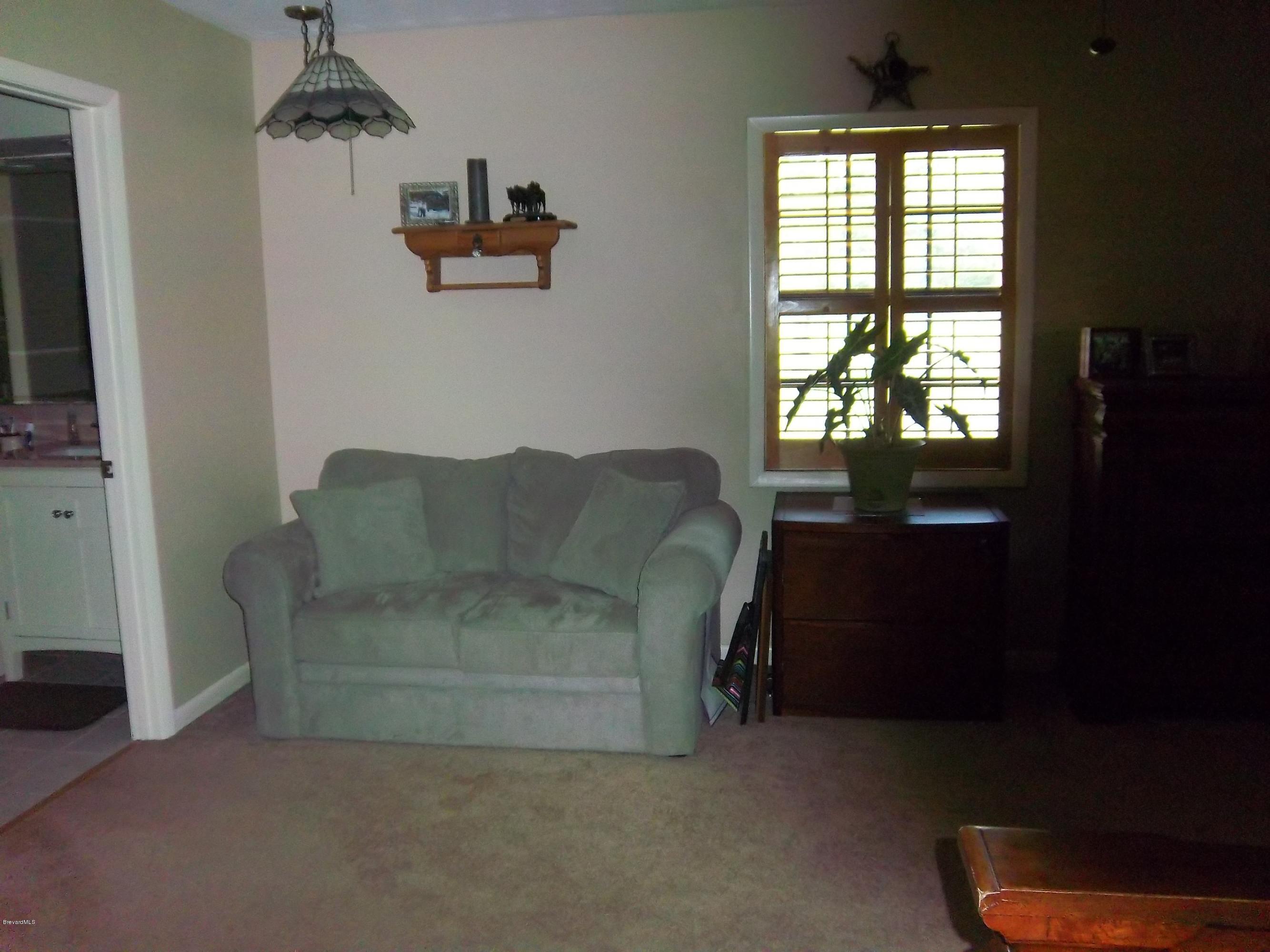 3695 Grant Road Grant Valkaria, FL 32949 - Photo 12 of 44 Master Bedroom Sitting Area