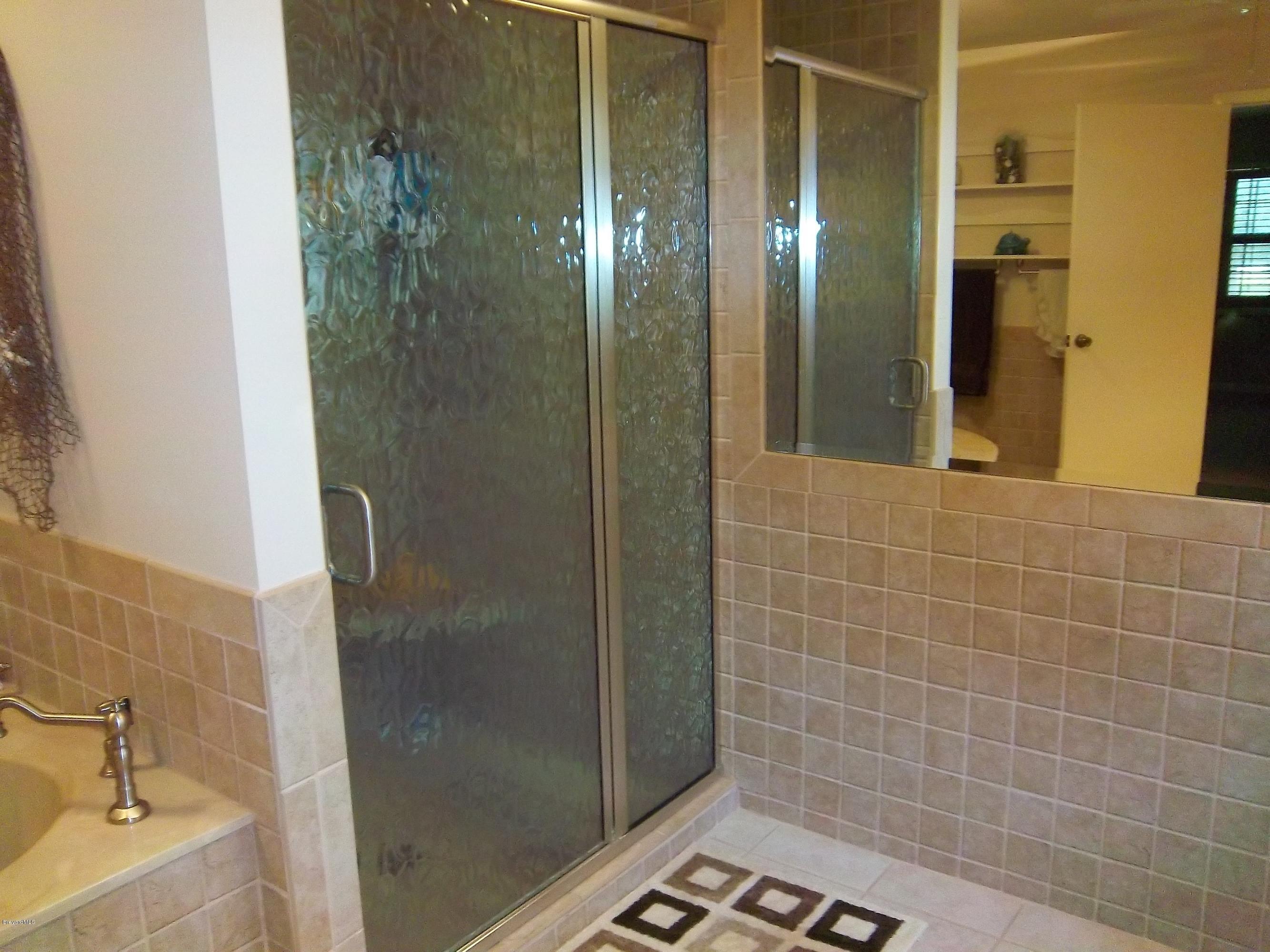 3695 Grant Road Grant Valkaria, FL 32949 - Photo 14 of 44 Master Walk-In Shower