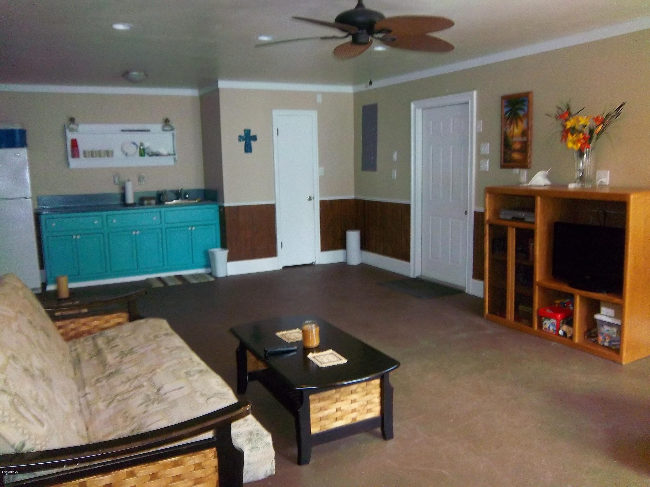 3695 Grant Road Grant Valkaria, FL 32949 - Photo 30 of 44 Guest House Living Room w/ Kitchen