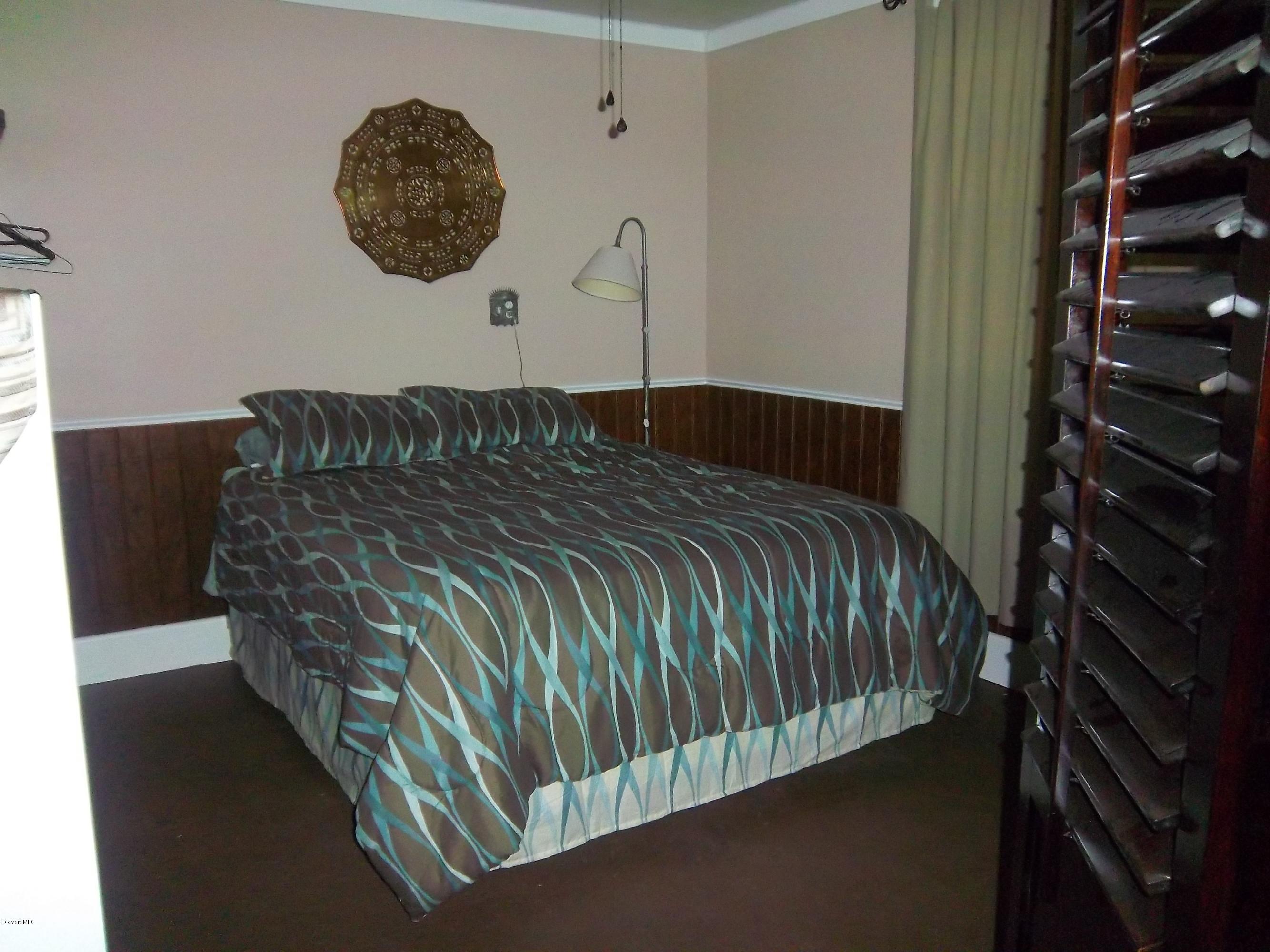 3695 Grant Road Grant Valkaria, FL 32949 - Photo 31 of 44 Guest House Bedroom