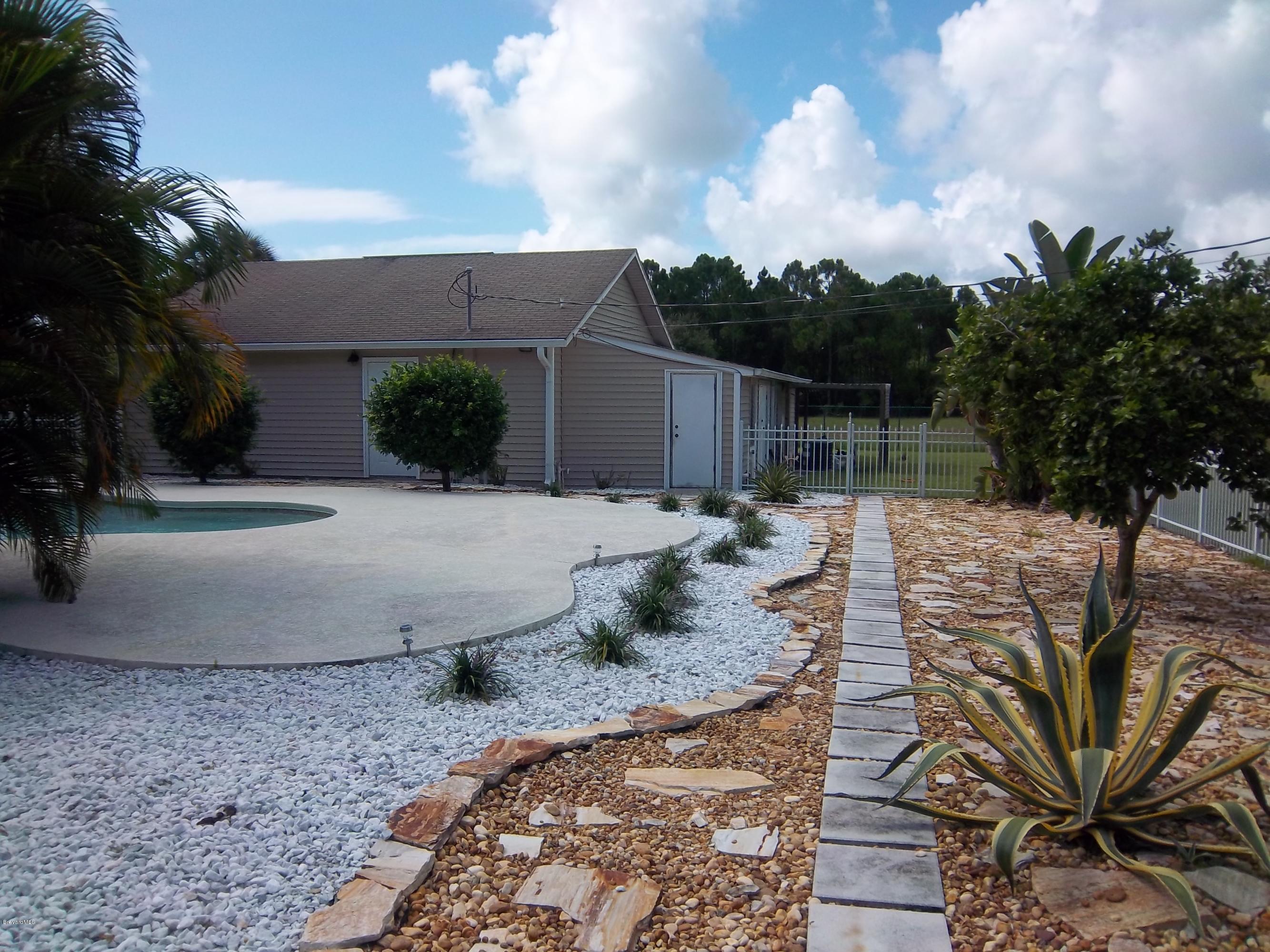 3695 Grant Road Grant Valkaria, FL 32949 - Photo 41 of 44 Side View