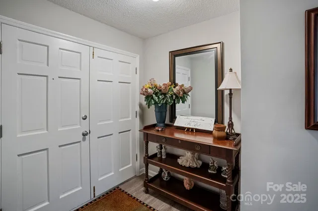 a view of cabinets and wooden floor