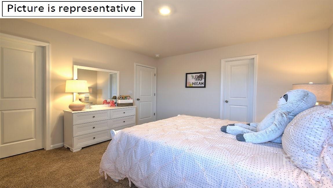 2164 Vanderlyn Street Monroe, NC 28112 - Photo 35 of 37 a bedroom with a bed and a dresser