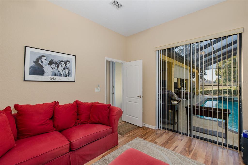 427 Archway Drive Spring Hill, FL 34608 - Photo 46 of 68 a livingroom with a couch and a couch