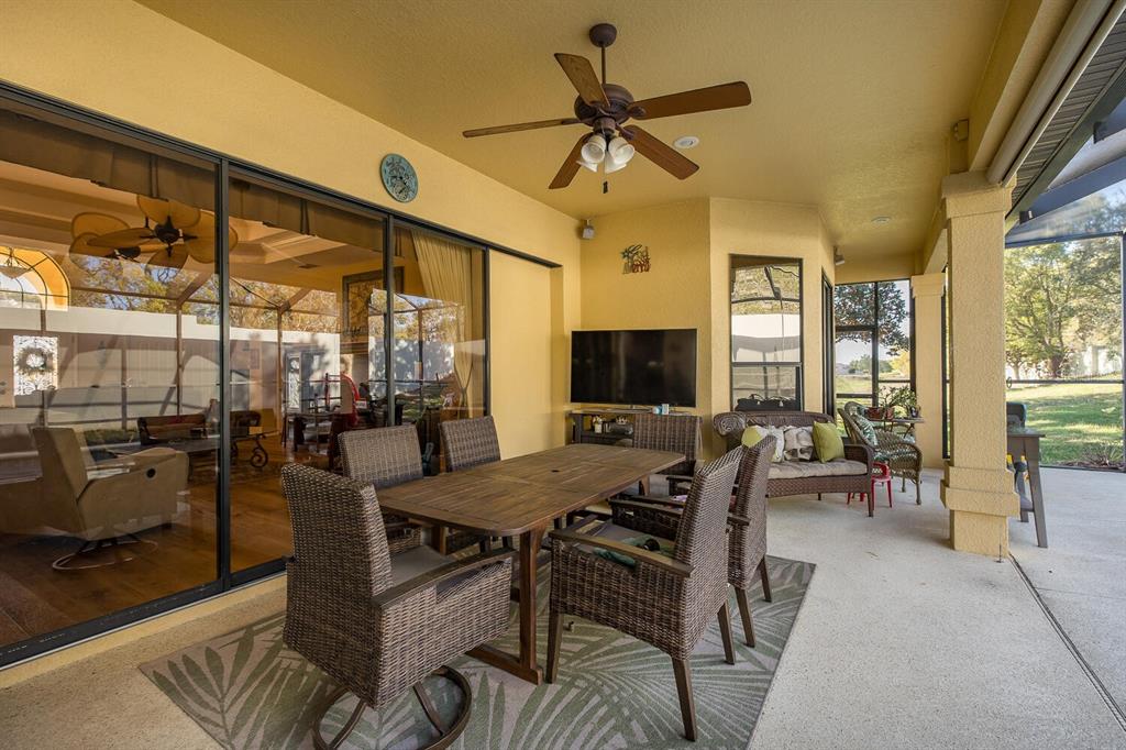 427 Archway Drive Spring Hill, FL 34608 - Photo 50 of 68 a view of a livingroom with furniture and a window