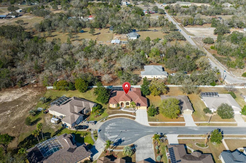 427 Archway Drive Spring Hill, FL 34608 - Photo 64 of 68 an aerial view of residential houses with outdoor space
