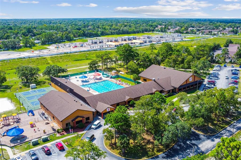 427 Archway Drive Spring Hill, FL 34608 - Photo 68 of 68 a view of a houses with a yard and lake view