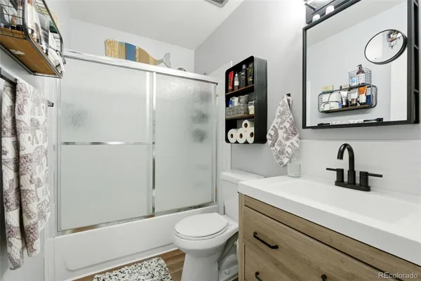 a bathroom with a sink and a toilet
