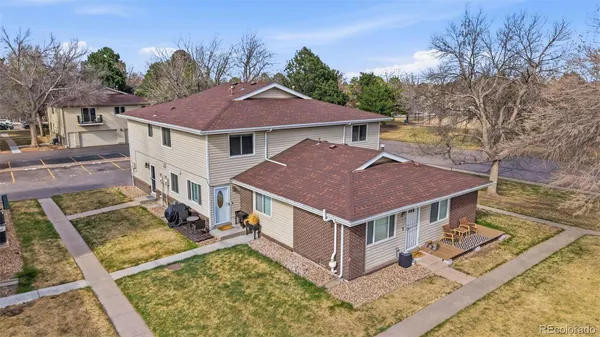 a view of a house with roof deck front of house