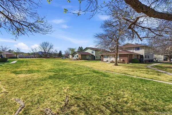a view of a house with a big yard