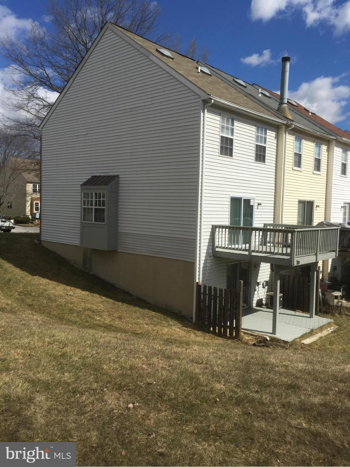 6965 Rockfield Road Baltimore, MD 21244 - Photo 3 of 18 a view of a house with backyard and sitting area