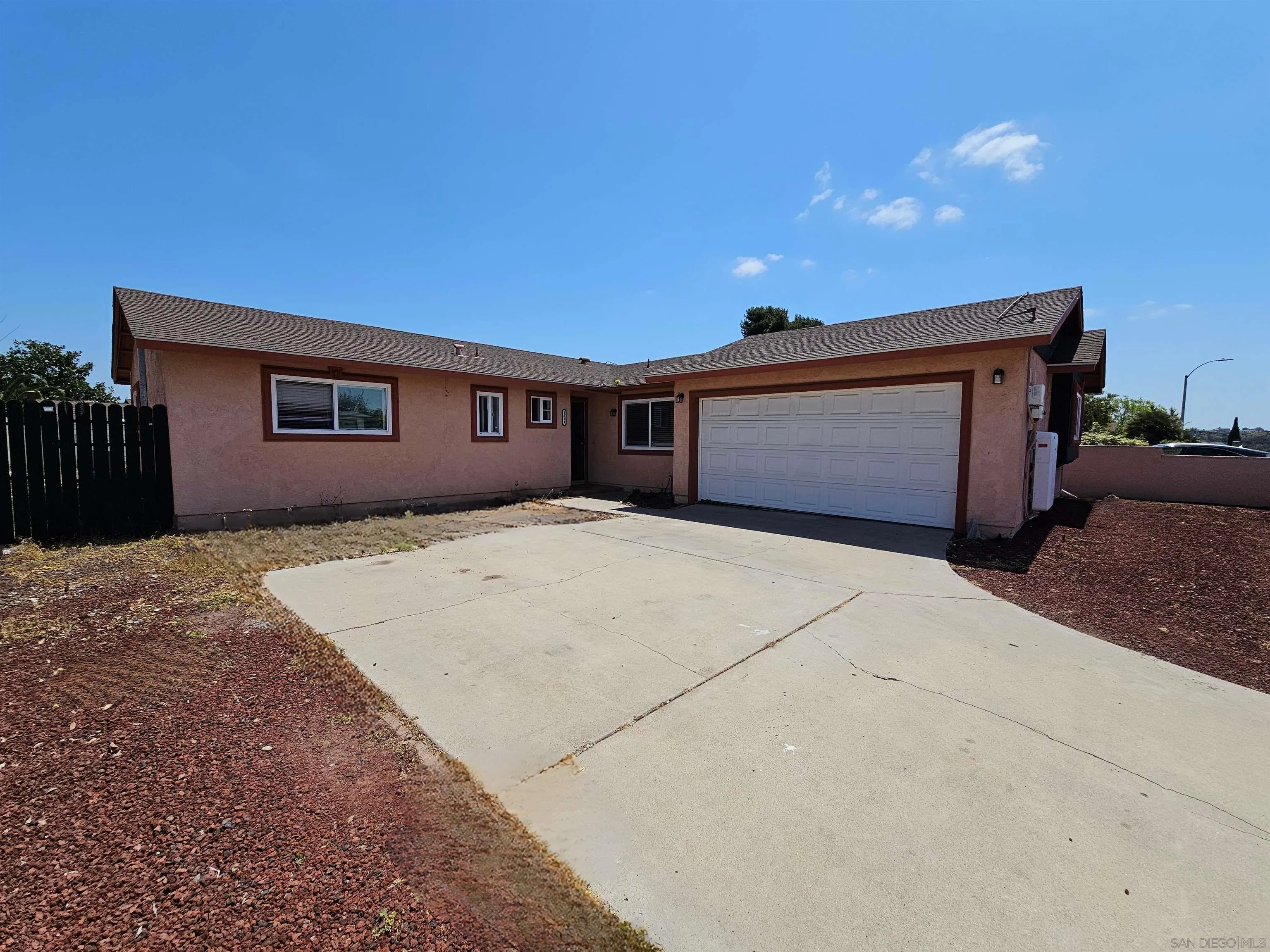 a front view of a house with a garage