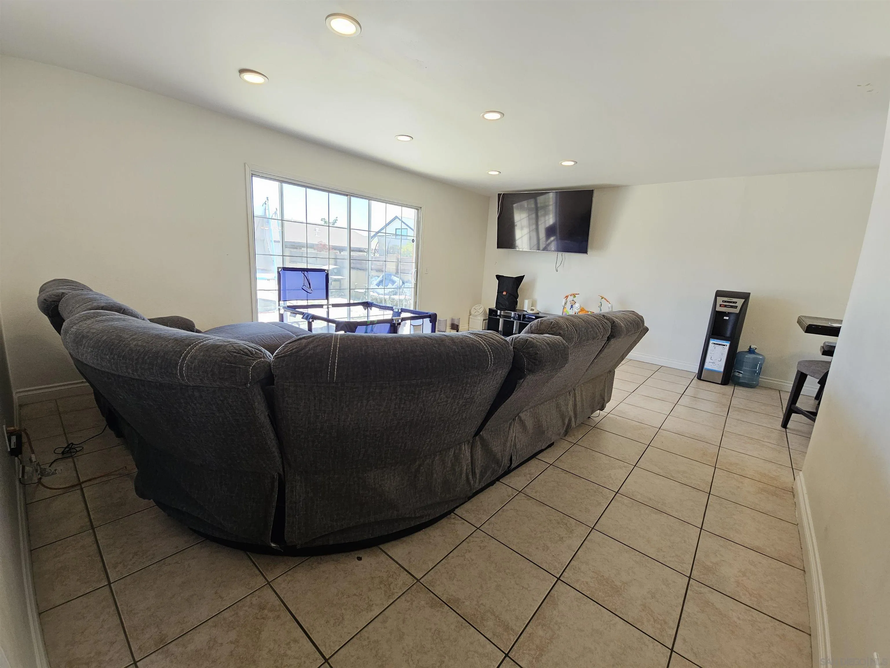 1621 Jade Avenue Chula Vista, CA 91911 - Photo 5 of 19 a living room with furniture and a window