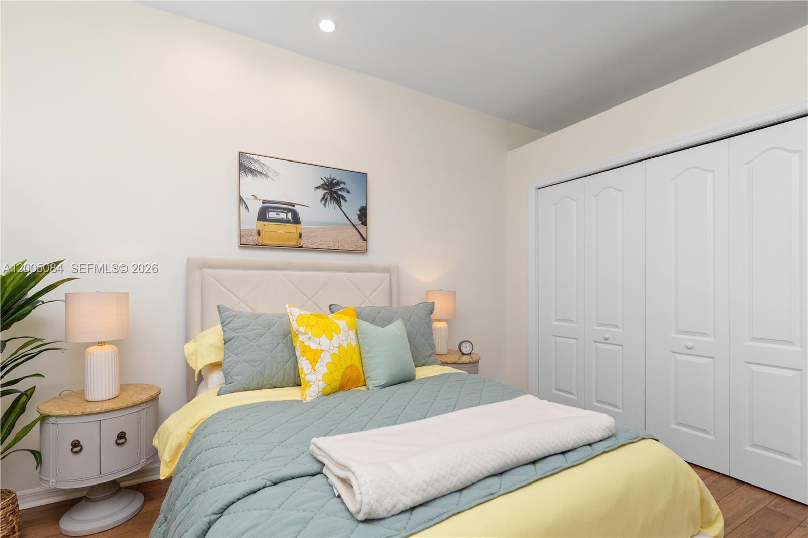 1896 Crestview Way Naples, FL 34119 - Photo 64 of 91 a bedroom with a bed and a couch