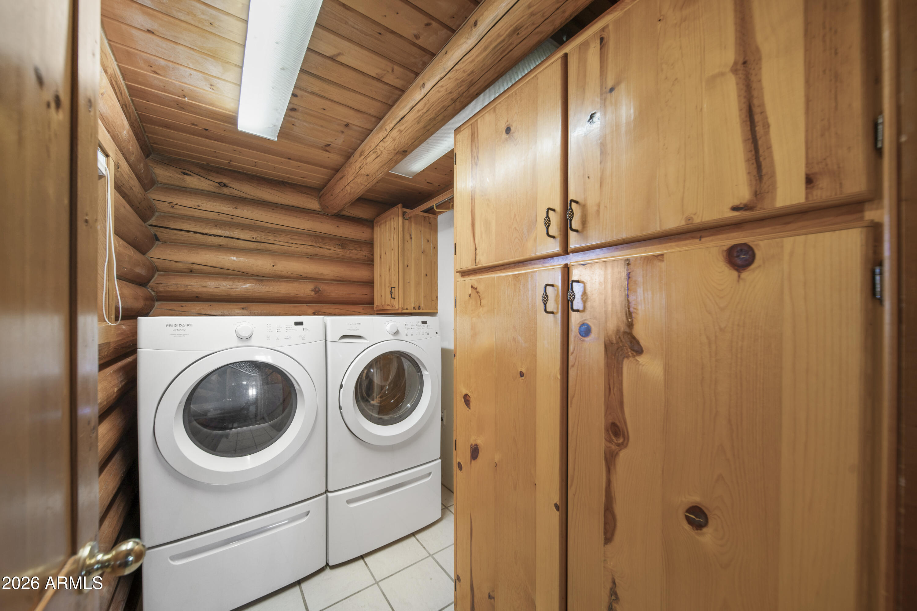 26162 Pecks Peak Road Kirkland, AZ 86332 - Photo 14 of 51 a utility room with dryer and washer