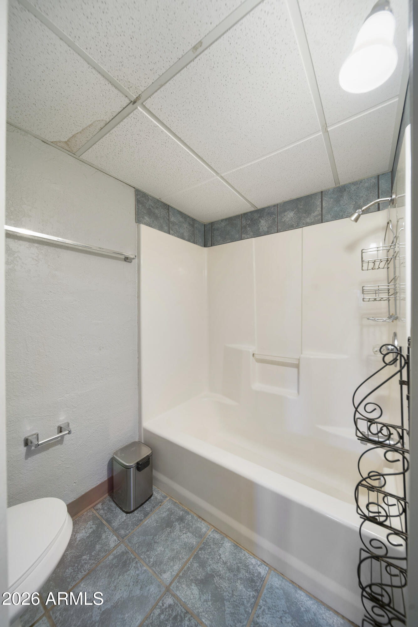 26162 Pecks Peak Road Kirkland, AZ 86332 - Photo 19 of 51 a bathroom with a toilet and a shower