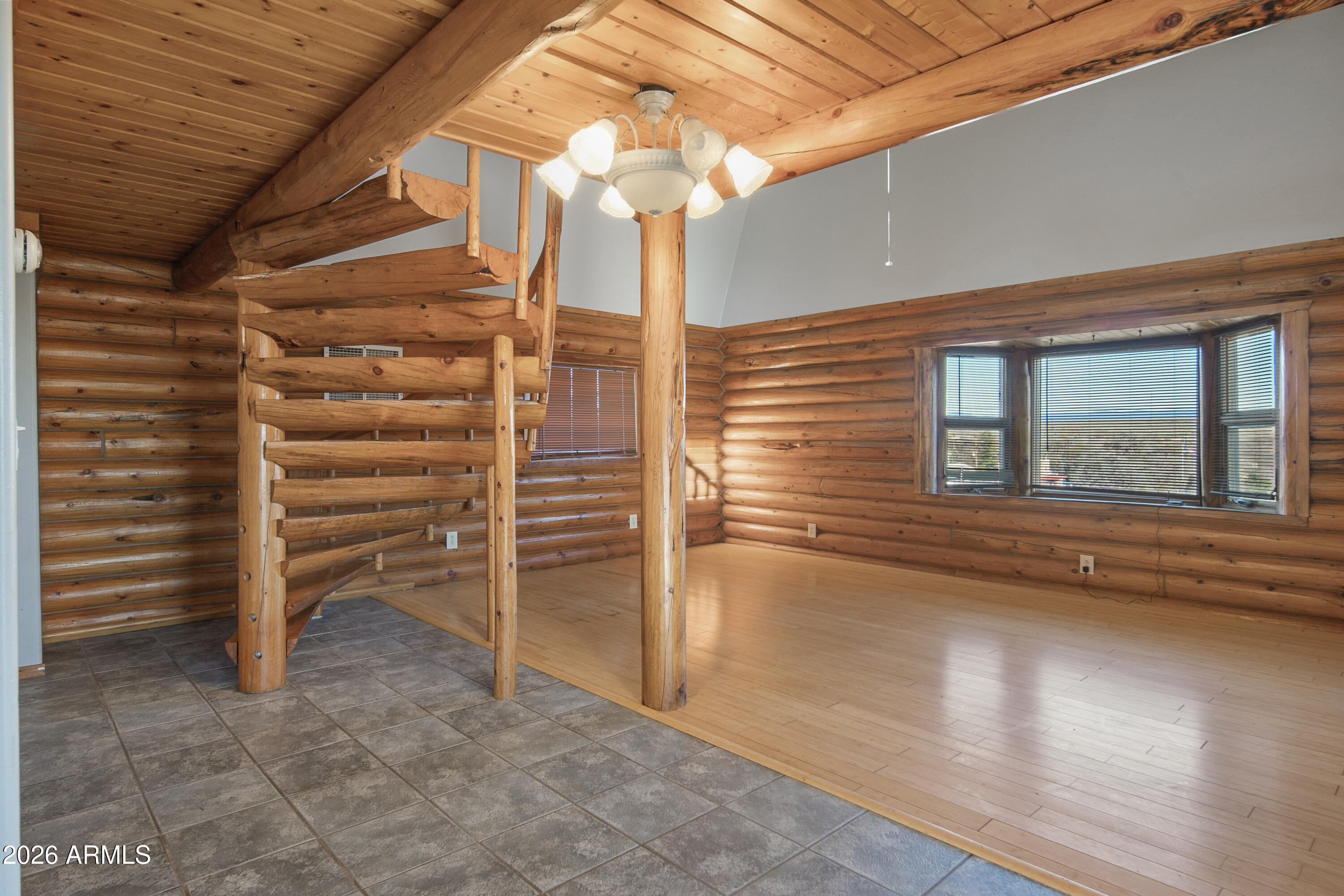 26162 Pecks Peak Road Kirkland, AZ 86332 - Photo 5 of 51 a view of a house with a door and wooden walls