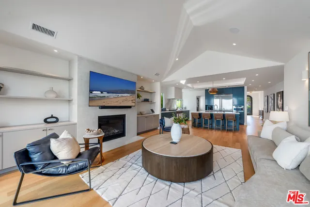 a bathroom with a shower and a glass door