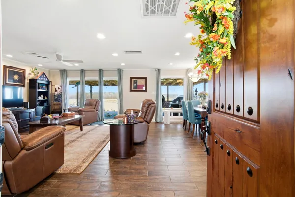 a living room with furniture and a table