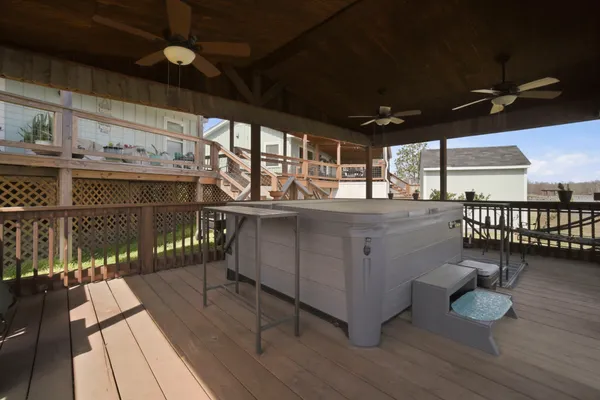 a view of a chairs and table in a patio