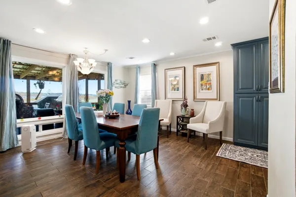 a living room with furniture and a table