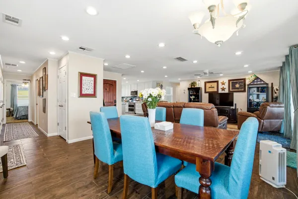 a view of a dining room with furniture