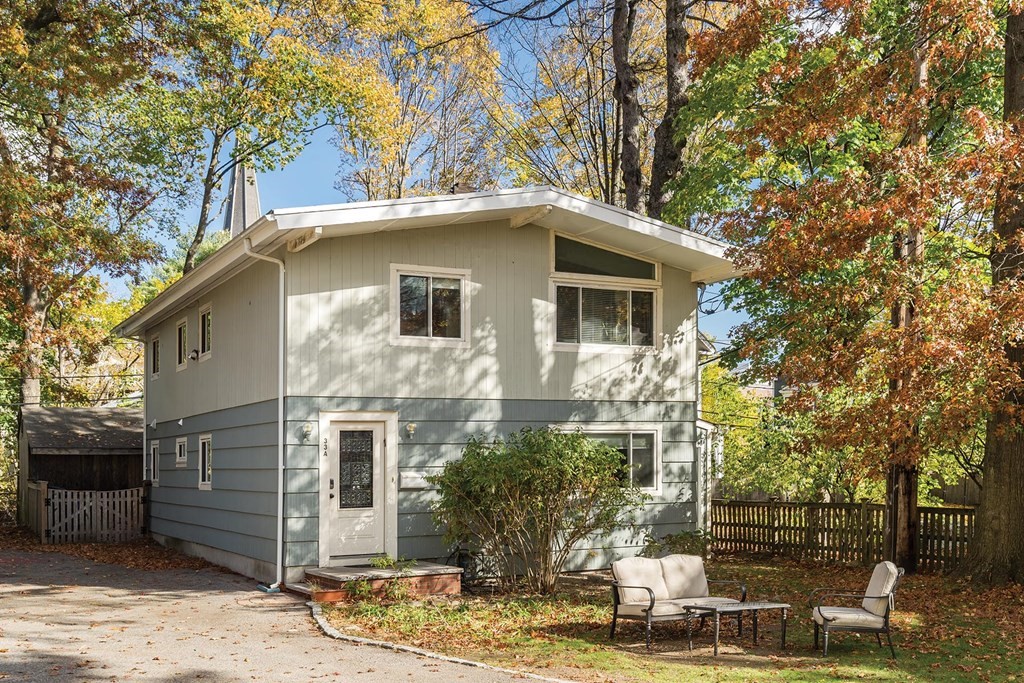 33 A Burroughs Street Boston, MA 02130 - Photo 1 of 15 a front view of a house with a tree