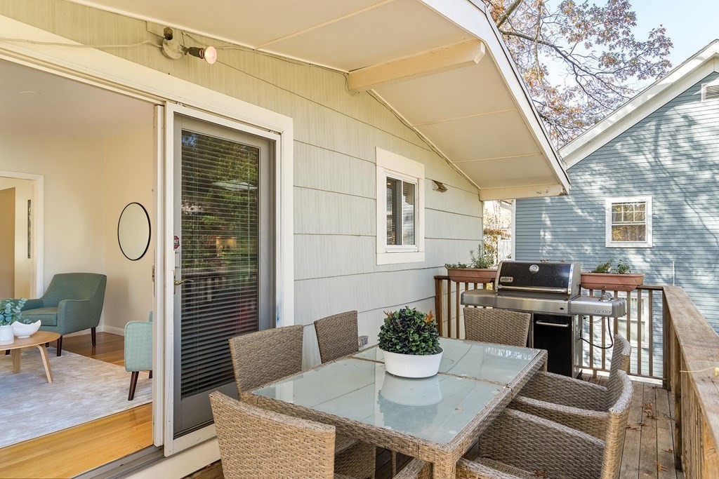 33 A Burroughs Street Boston, MA 02130 - Photo 14 of 15 a view of a dining room with furniture and wooden floor