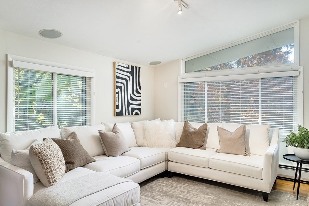 33 A Burroughs Street Boston, MA 02130 - Photo 2 of 15 a living room with furniture and a large window