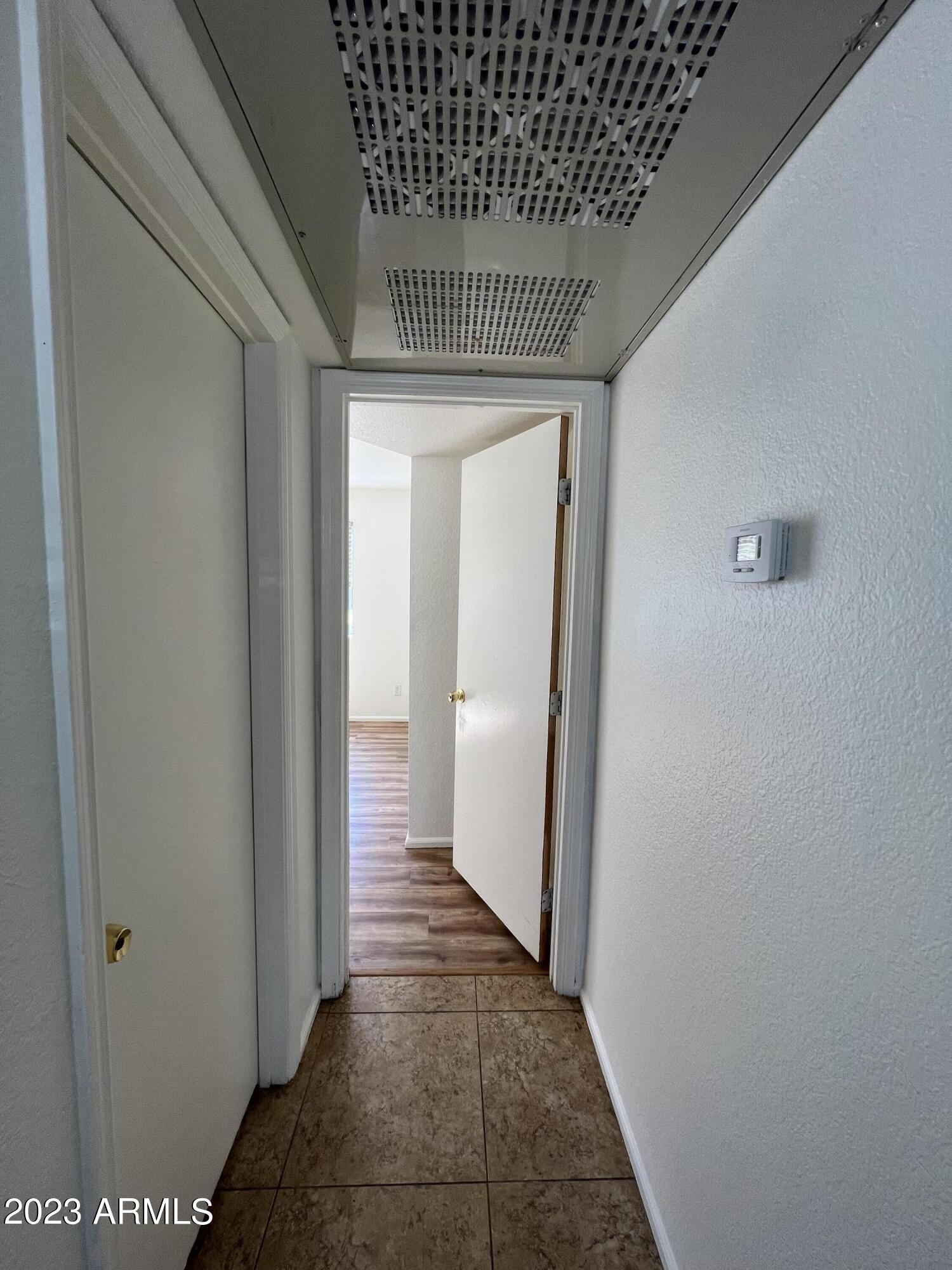 15402 North 28th Street, Unit 119 Phoenix, AZ 85032 - Photo 22 of 28 a view of hallway