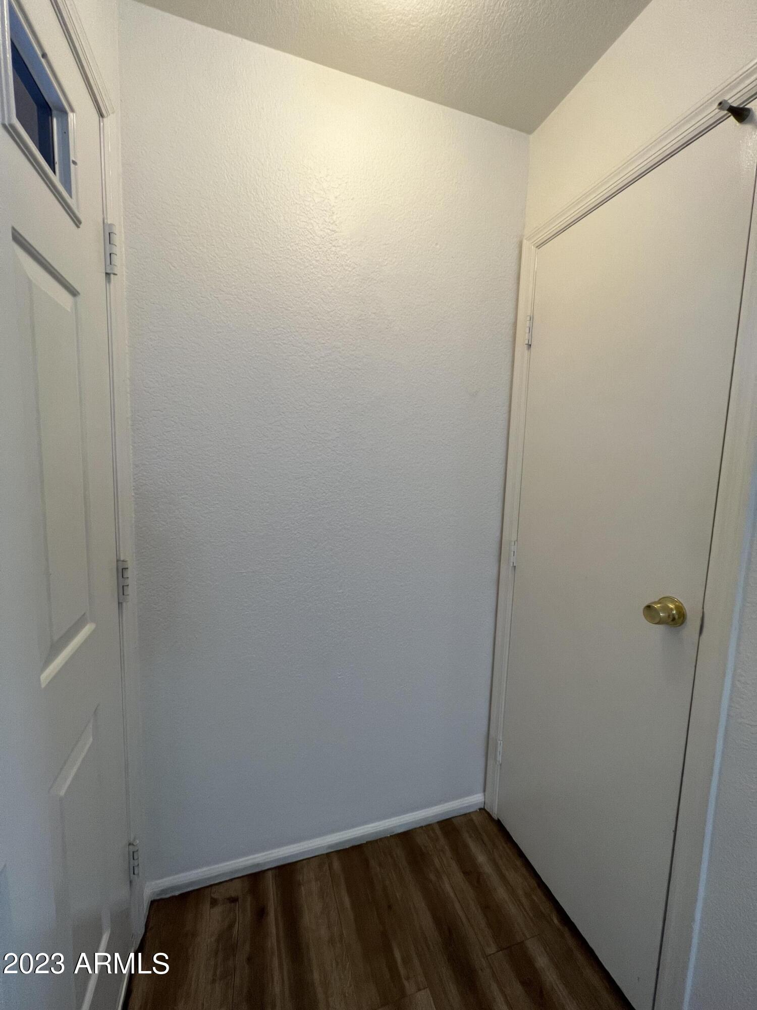 15402 North 28th Street, Unit 119 Phoenix, AZ 85032 - Photo 9 of 28 a view of small space with wooden floor