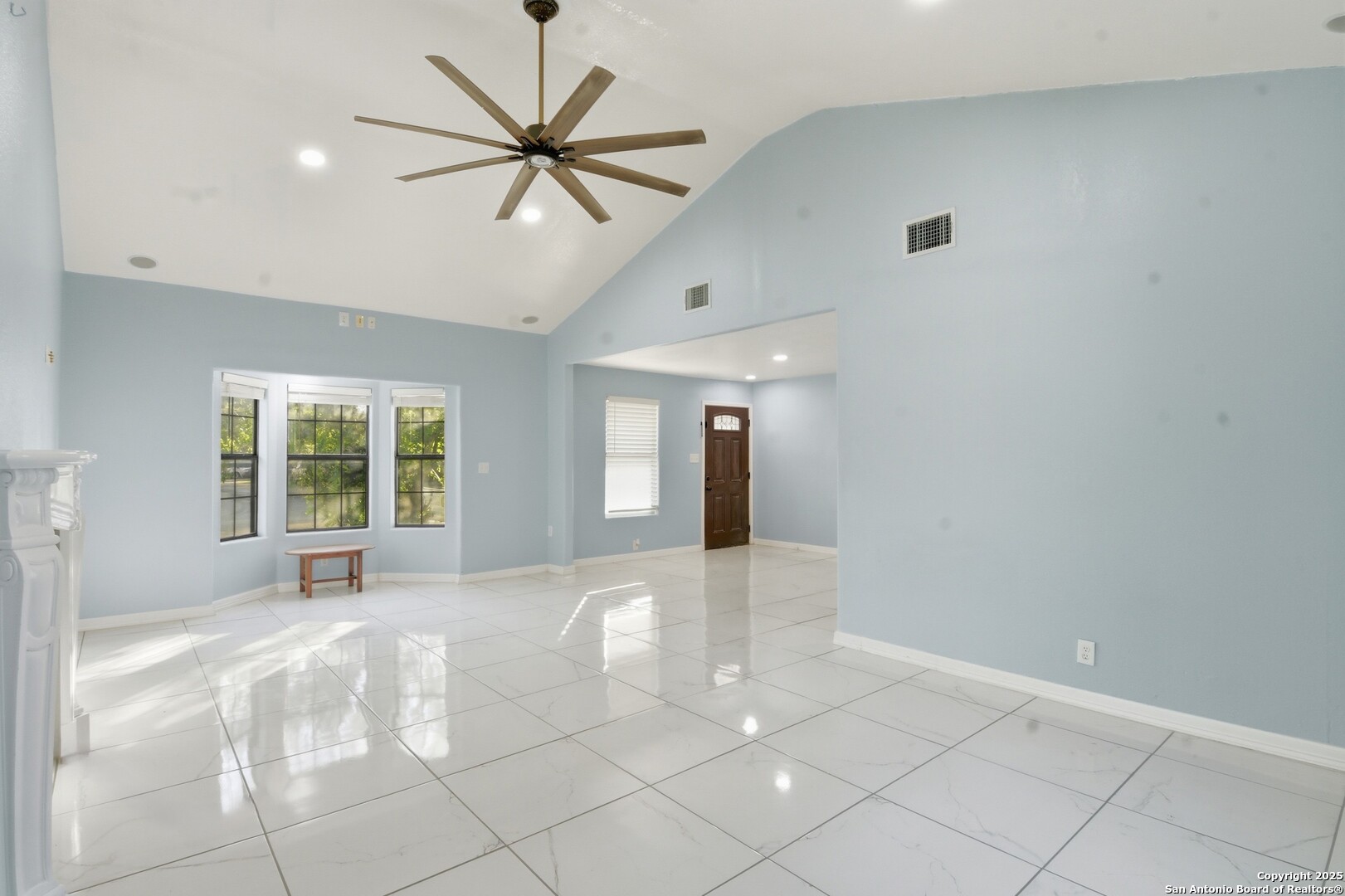 521 Old Carrizo Road Uvalde, TX 78801 - Photo 15 of 31 a view of a livingroom with a ceiling fan and window