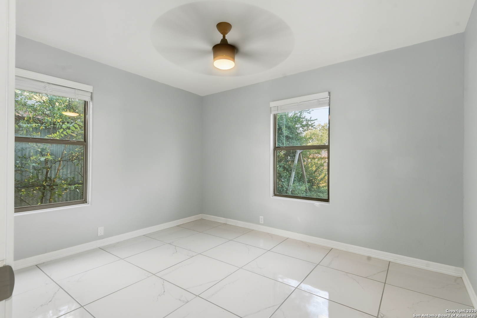 521 Old Carrizo Road Uvalde, TX 78801 - Photo 17 of 31 a view of an empty room and window