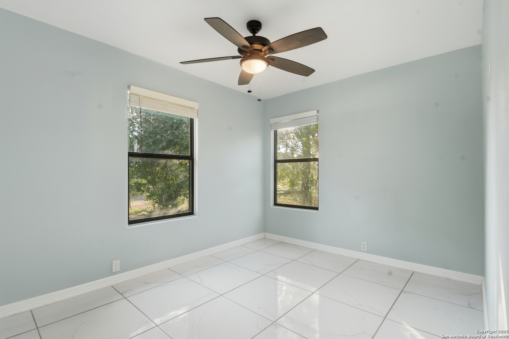 521 Old Carrizo Road Uvalde, TX 78801 - Photo 18 of 31 a view of an empty room with a window