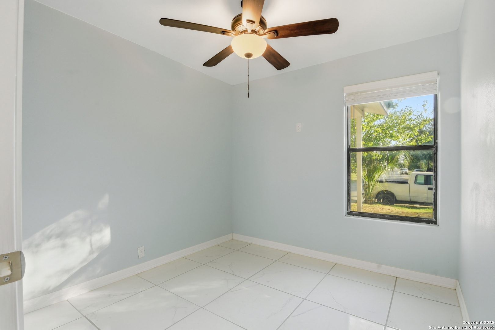 521 Old Carrizo Road Uvalde, TX 78801 - Photo 20 of 31 a view of an empty room with a window