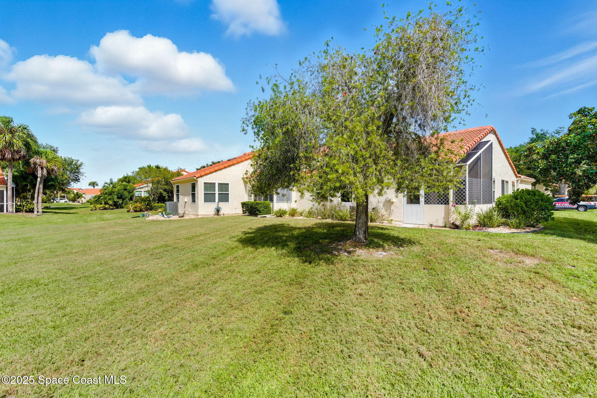 710 Spring Valley Drive Melbourne, FL 32940 - Photo 28 of 30 a view of backyard of house with green space