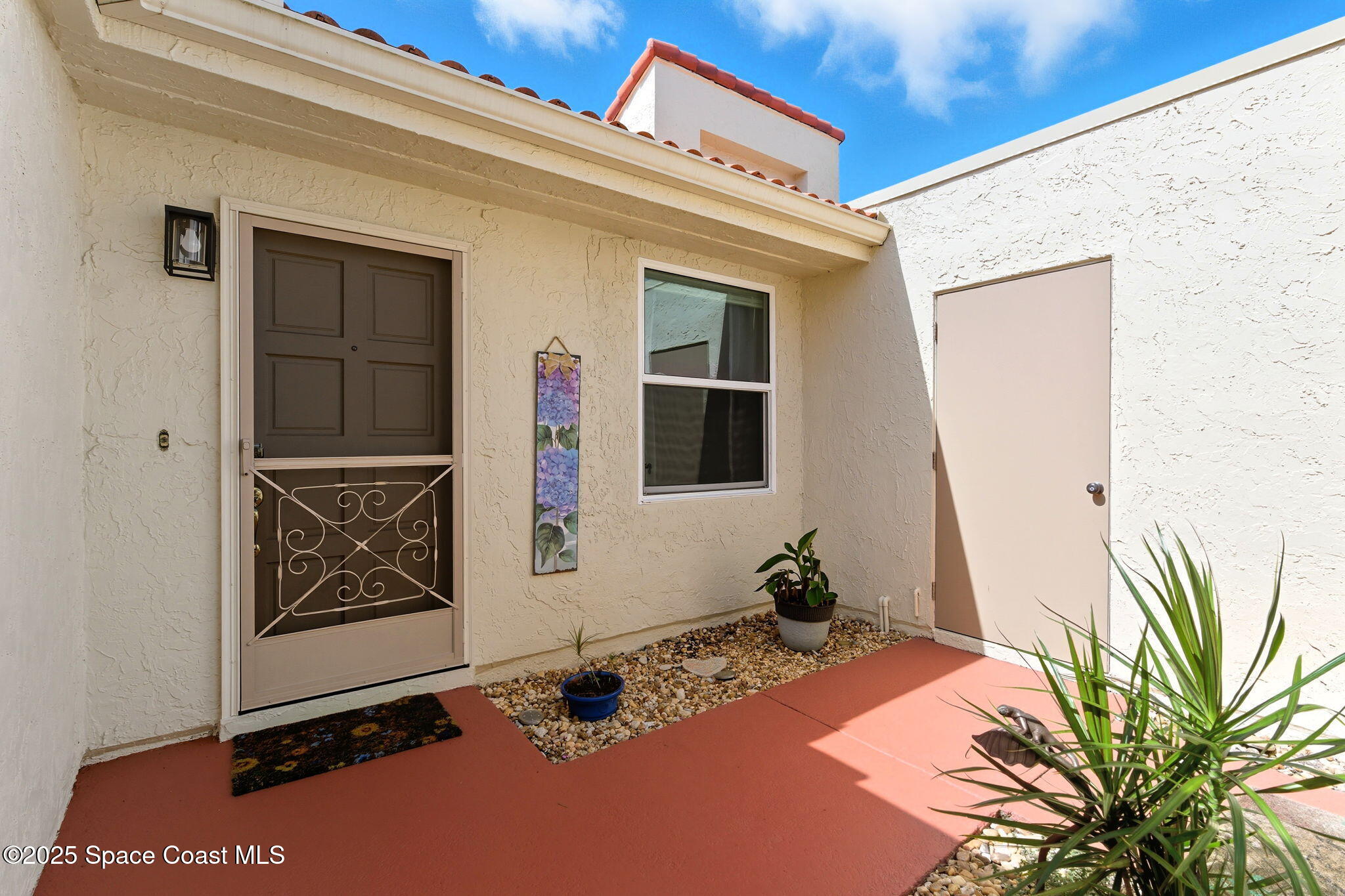 710 Spring Valley Drive Melbourne, FL 32940 - Photo 8 of 30 a front view of a house