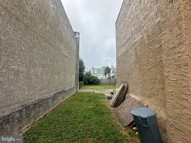 a view of a bathroom with a toilet and a shower